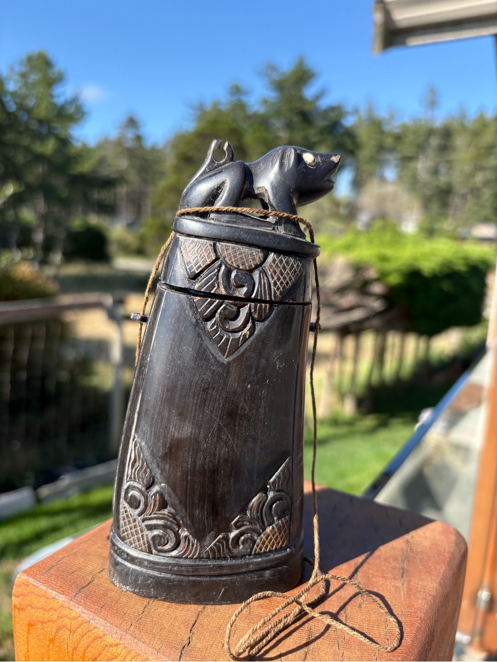 Carved buffalo horn with dog motif ..Shaman’s medicine pot